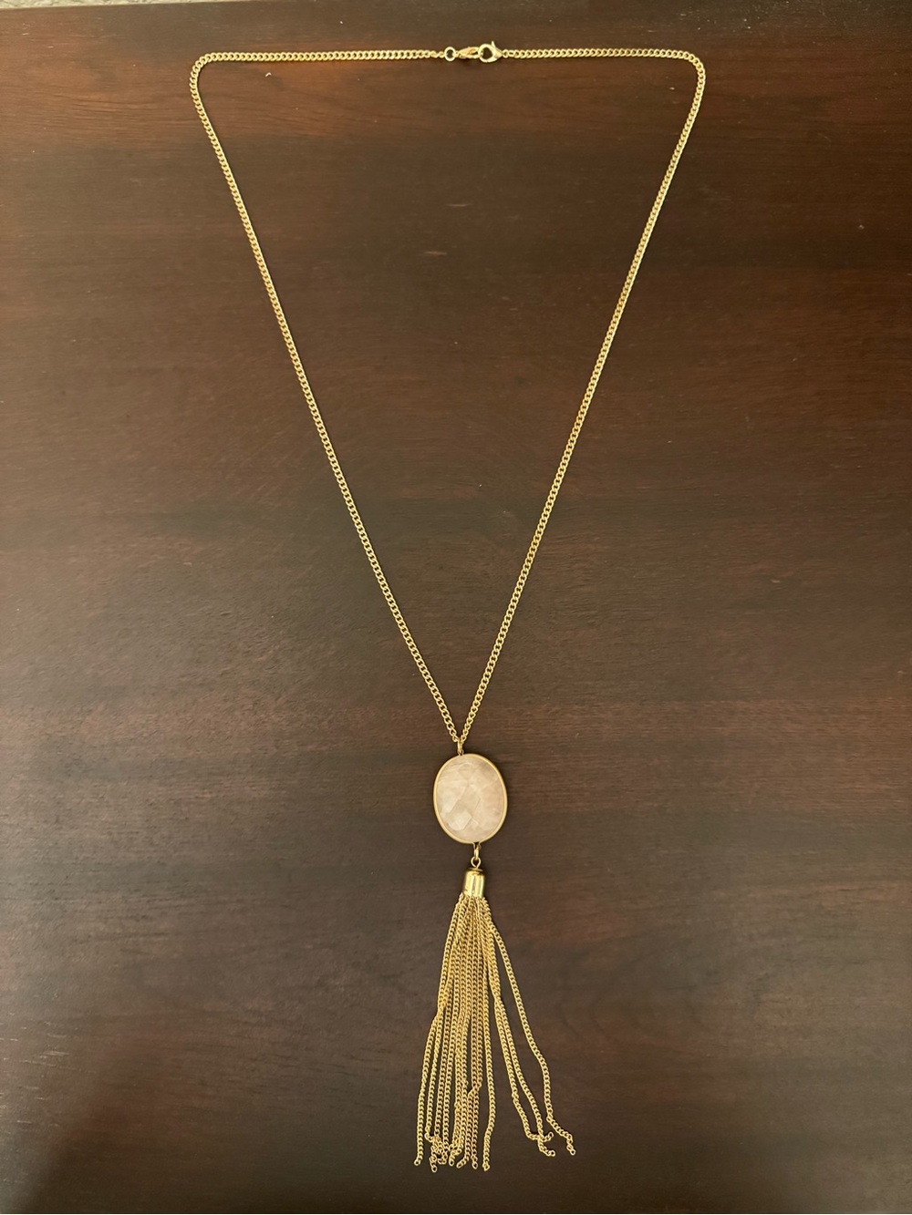 Soft Pink Stone Pendant and Gold Tone Tassel Necklace